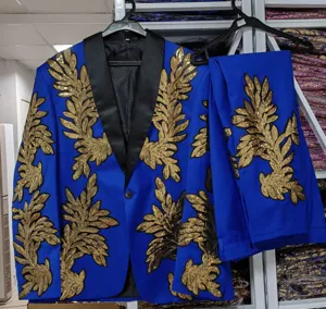 Conjunto de chaqueta y pantalon de traje con lentejuelas doradas y azules para hombre