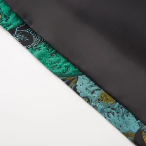 Détail de veste de costume décontracté pour hommes tissu jacquard rétro gros plan style de mode