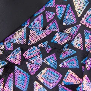 Men's stylish triangle sequin suit jacket detail, perfect for evening party wear and events.