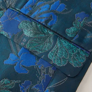 Détail du tissu de veste de costume casual jacquard rétro pour homme avec motif floral.