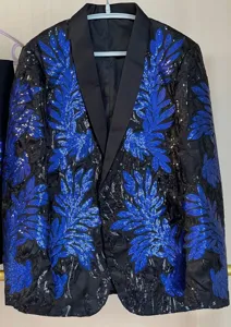 Men's blue and black sequin leaf patterned suit jacket detail showing elegant satin lapel.