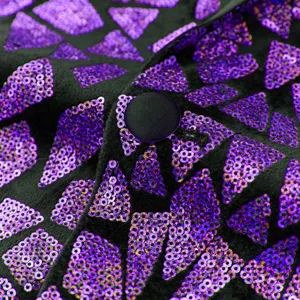 Close-up detail of men sequin suit jacket, black velvet fabric with purple triangle sequins.