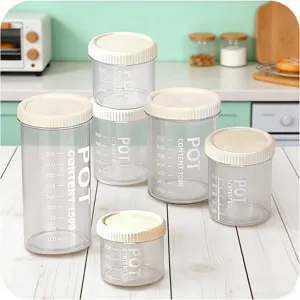 Plastic food storage jars set with lids and capacity scale marks for kitchen organization.