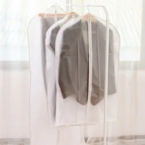 Translucent garment cover bag dustproof suit storage organizer for winter coats and sweaters.