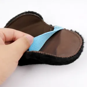 Portable faux wool shoe shine glove with elastic band, soft cleaning mitt for leather care.