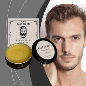 Detail view of men's beard balm tin and packaging box, moisturizing and non-greasy formula.