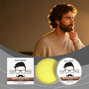 EAST MOON mens moustache wax detail view, smooth texture tin container for daily beard care.
