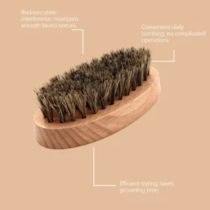 Natural boar bristle beard brush for daily grooming, gentle on skin and smooth styling.