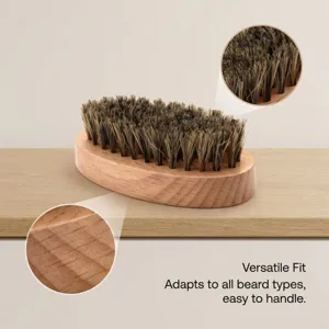 Detail shot of wooden beard brush with natural bristles, showing bristle and wood texture.
