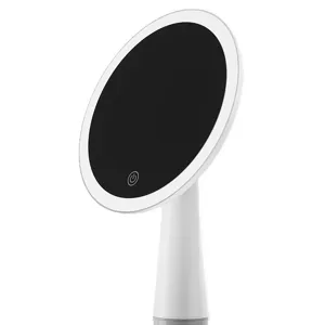 White desktop LED makeup mirror with touch switch and round lighted vanity design.