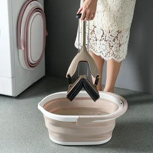 Cubo plegable portátil y mopa de esponja, diseño ahorra espacio para la limpieza del hogar.