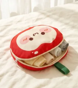 Borsa di stoccaggio rotonda portatile per biancheria intima con simpatico viso e cerniera.