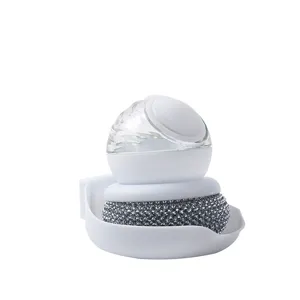 Kitchen press liquid dispensing pot brush with rhinestone scourer and base, clean and practical.