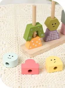Wooden geometric sorting stacking educational toy detailed view showing colorful shapes with cute faces.