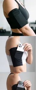 Dettagli in primo piano della fascia da braccio sportiva nera con elevata elasticità e tasca.