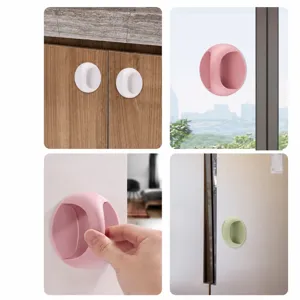Punch-free adhesive door handle for cabinet, drawer, window, and wardrobe. Traceless plastic pull.