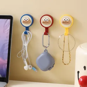 Creative funny cartoon wall hook adhesive rotating hook for home dormitory hanging storage.