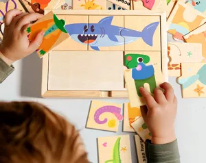 Kids wooden animal puzzle board with ocean theme shapes and English letters for early learning.