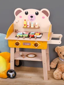 Children wooden barbecue grill toy detail showing cute bear design and food accessories.