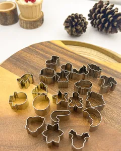 Stainless steel Christmas cookie cutters set, detailed view of various baking mold shapes.