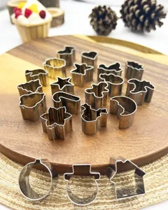 Detailed view of various shapes from the stainless steel Christmas cookie cutter set.