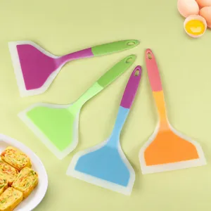 Colorful silicone spatula set for non-stick pans, ideal for cooking eggs and kitchen use.