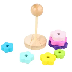 Jouet de tour à empiler en bois pour enfants, anneaux colorés en forme de fleur.
