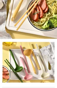Silicone kitchenware detail featuring colorful chopsticks and long-handled soup spoons.