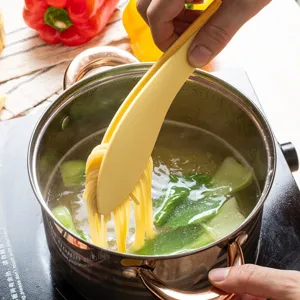 High temperature resistant leaf shaped silicone food tong, ideal for cooking and barbecue.
