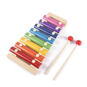 Close-up detail of children colorful wooden eight-tone xylophone with two wooden mallets.