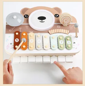 Wooden multi-functional musical toy with drum and xylophone for kids early education.