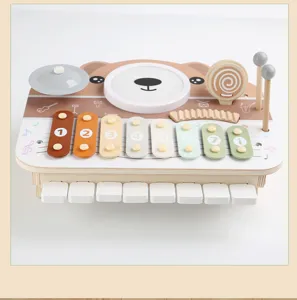 Wooden multi-functional musical toy with xylophone, piano keys, drum and cute bear design.