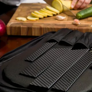 Detail of black carbon fiber texture knife sheath and portable kitchen knife roll pouch.