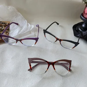 Stylish cat-eye clear glasses frames for women, trendy color block anti-blue light eyewear.