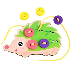 Wooden hedgehog threading toy, early educational button string game for toddlers and kids.