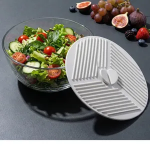 Silicone bowl lid and heat insulation mat set, versatile kitchen pad for food prep.
