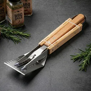 Stainless steel BBQ tool set with wooden handle for outdoor camping and home grilling.