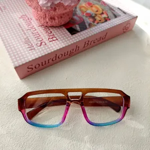 Gafas transparentes de doble puente, montura degradada de moda para un uso diario.