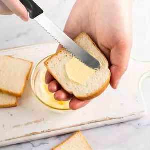 Stainless steel butter knife with black plastic handle, ideal for spreading bread and butter.