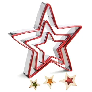 Stainless steel star cookie cutter set with red rim for baking Christmas holiday biscuits.