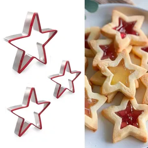 Stainless steel star cookie cutter set for baking Christmas cookies, durable metal molds.