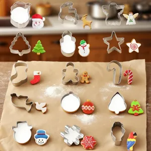 Stainless steel Christmas cookie cutter set with gingerbread man and tree molds for baking.