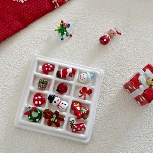 Detailed view of assorted Christmas glass charms and DIY pendant accessories, perfect for crafts.