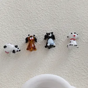 Cute handmade cartoon animal glass beads detail view for DIY bracelets and earrings.