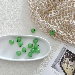 Green glass fruit charms beads for DIY jewelry making, crafts, and handmade accessories.