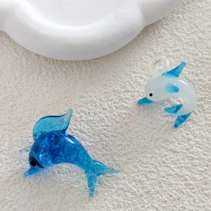 Glass dolphin pendant detail, cute 3D blue beaded accessory for DIY earrings and bracelets.