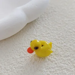 Cute yellow duck glass bead for DIY jewelry making, bracelet and necklace accessory.