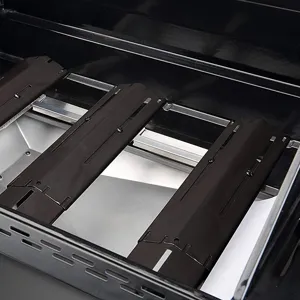 Detailed view of universal adjustable grill heat plate and burner shield replacement parts.