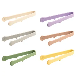 Pinza per alimenti in silicone colorato con design a zampa di gatto per cubetti di ghiaccio.