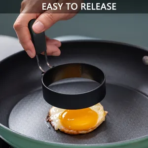Non-stick fried egg mold ring with anti-scald handle, perfect for quick breakfast cooking.